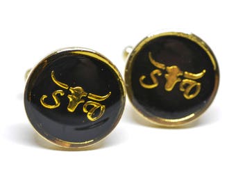Gold tone cuff links