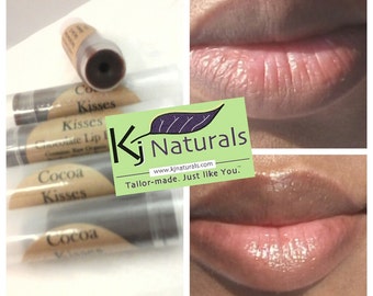 Cocoa Kisses: Chocolate lip butter! 100% natural. Light brown chocolate gloss on lips! Naturally tinted with raw organic cocoa powder