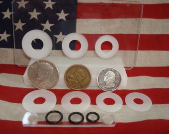 U.S. LARGE COIN Centering punch card fits the fifty cent piece, small dollar, and quarter.