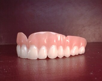 Upper full acrylic denture, with wax try-in. (remaining balance payment)