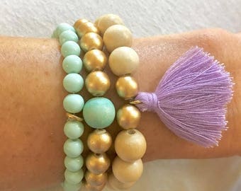 Natural, Gold, and Mint Wood and Glass Mix Beaded Bracelet Stack with Purple Tassel