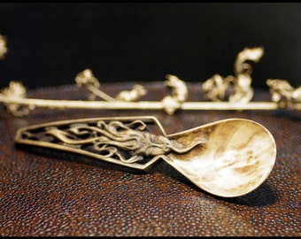 wooden spoon with curly handle