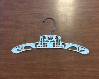 Vintage children's plastic hanger with sheep in blue
