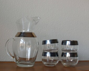 Vintage Roly Poly barware glasses with a thin silver band with pitcher