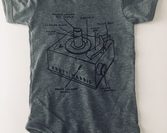 Brett Harris 45 Player one-piece, size 6-12 months, grey with black print
