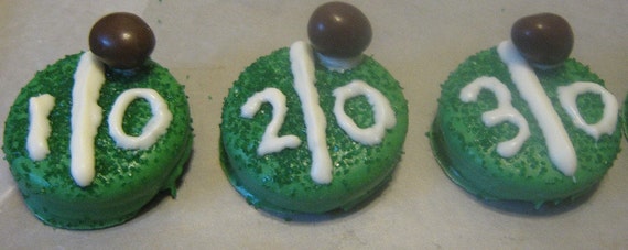 One dozen football yardlines with peanut candy football chocolate covered sandwich cookies