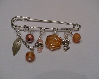 Brooch with dangle Orange