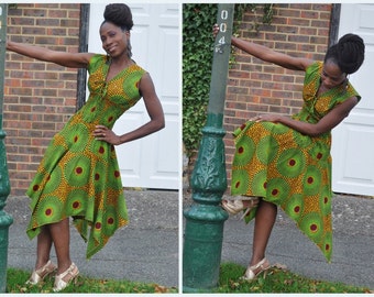 African print midi dress with handkerchief hem in green with mustard hues