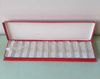 12 vintage Val St. Lambert Crystal knife rests