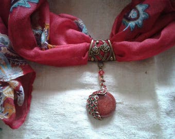 pretty red scarf and his Peacock jewelry