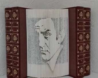 Folded book-cut Lino Ventura