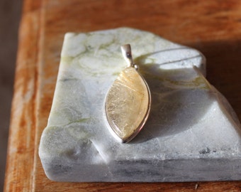 Rutilated quartz and Silver pendant