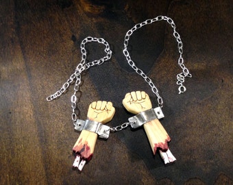 Severed Arms in Manacles and Chains - scroll saw necklace - a grim handmade product. FREE GLOBAL SHIPPING