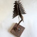 Metal rusty Christmas tree industrial style. Handmade. Art object