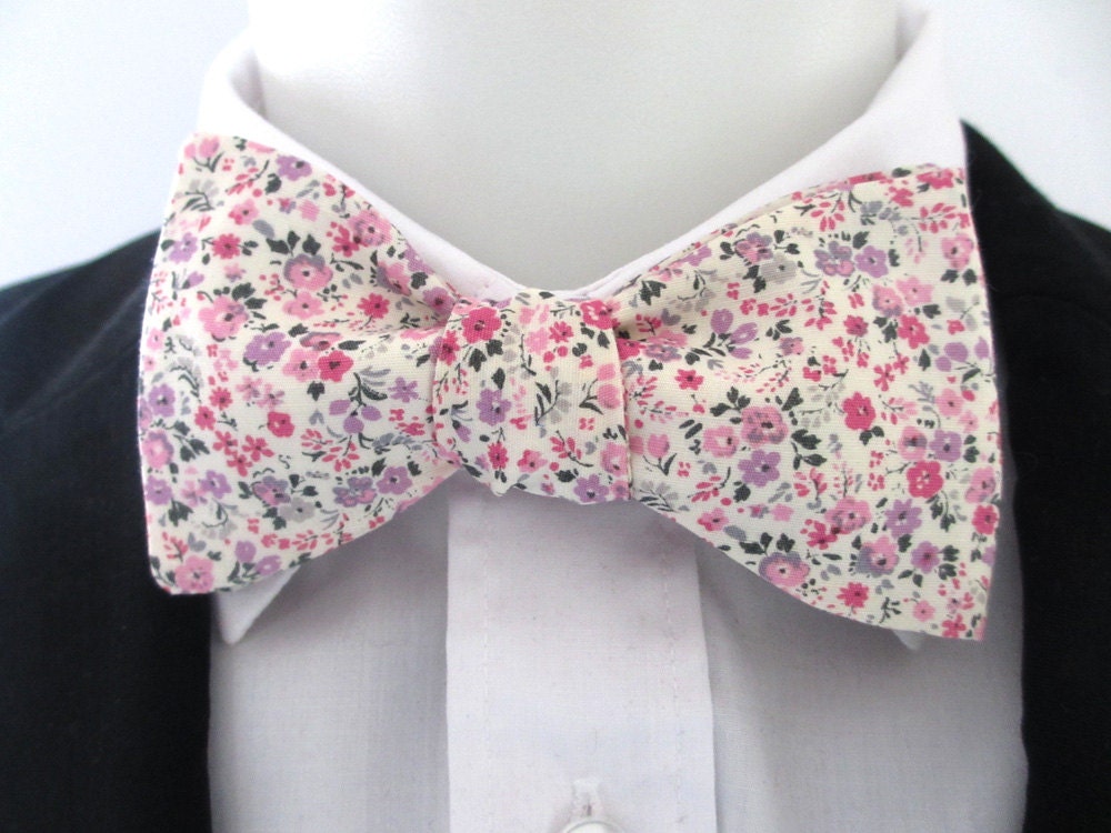 Men's bowtie in a pink and purple floral design
