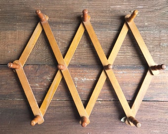 Vintage wooden wall peg rack, accordian, expanding, fold out, 10 pegs
