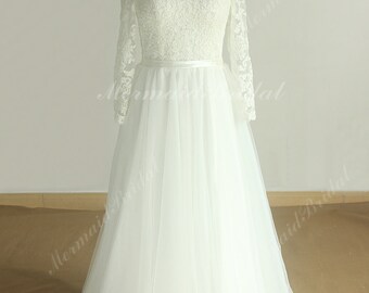 Romantic flowy tulle lace destination wedding dress with keyhole back and long sleeves