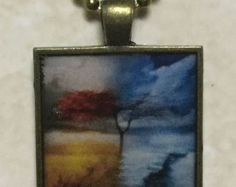 Resin covered design pendant