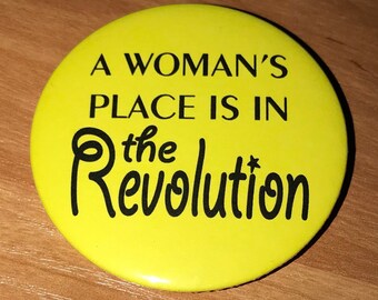 A woman's place is in the revolution badge