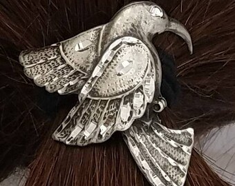 Single humming bird pony tail cover