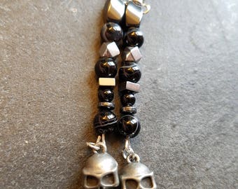 Skull dangle earrings