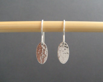 tiny silver dangle earrings. small hammered silver oval earrings. everyday leverback lever back hook drop earrings. simple jewelry.