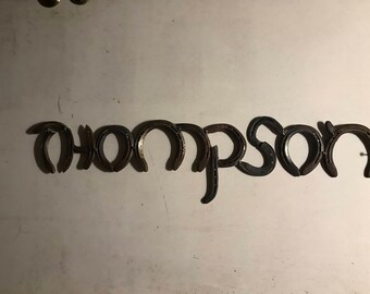 Customizable horseshoe signs