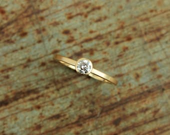 750 gold ring with diamond