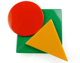 Geometric pin, signed HELENA RUBINSTEIN