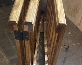 Folding dog gate