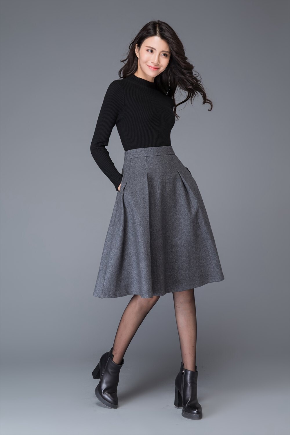 top with grey skirt