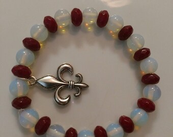 Ruby and Moonstone bracelet with fleur-de-lis accent