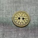 Bronze metal button