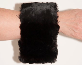 Vintage cufflinks with a black fur coat 1940-1960