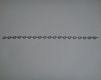Cut paper chain shiny silver design for suspension for scrapbooking and card