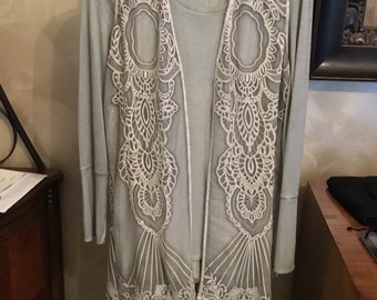 Long fringed vest, with long sleeve t-shirt. Size small/med