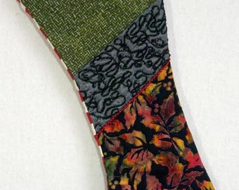 Quilted Christmas stocking, Black, red and green stocking