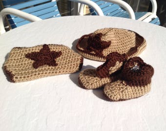 Cowboy booties, hat, and diaper cover.