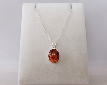 Sterling Silver 8 x 10mm Oval Amber Pendant Necklace.