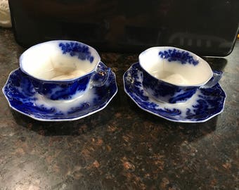 Antique flow blue china tea cup saucer