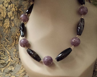 Black Onyx and purple artist glass beads