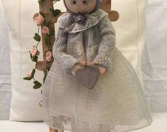 Handmade cloth doll.