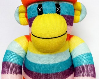 Cheeky Striped Sock Monkey with removable orange pom pom hat