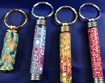 Secret compartment keychains