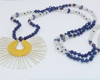Necklace with hematite,suede element and brass with gilded items