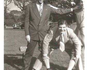 Vintage Snapshot "Just Foolin' Fun-Loving Guys Man Pulls Up Pants Legs Black & White Found Vernacular Photo