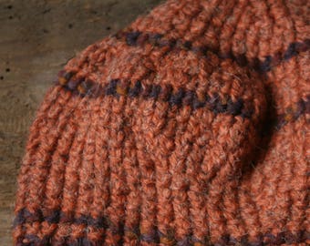 Cap in raw orange wool made at crochet