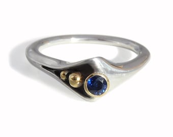 Modern "Folded" Silver+18 karat Gold Ring, Blue Sapphire. Contemporary designer fine jewelry. Alternative engagement ring