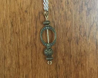 Gold-tone oval, round, & rondel beads pendant (gold-tone hardware)