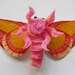 plush rosy maple moth